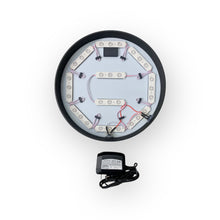 Load image into Gallery viewer, Circular electronic device with wiring and a power adapter on a white background