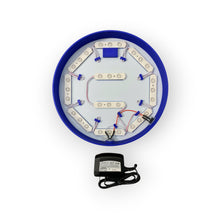 Load image into Gallery viewer, Circular electronic device with blue rim and white interior on a white background