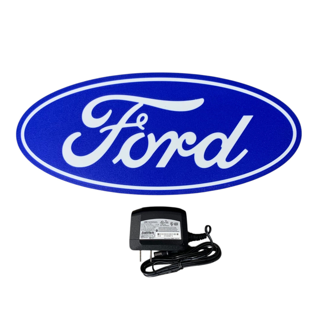 Ford led sign with a power adapter on a white background