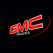 Load image into Gallery viewer, GMC Trucks led sign in red and white on a black background