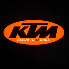 Load image into Gallery viewer, KTM led sign lit up with &#39;Ready to Race&#39; text on a black background