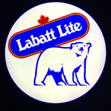 Load image into Gallery viewer, Labatt Lite logo with a bear graphic on a white circle on LED indoor sign