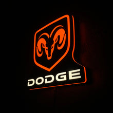 Load image into Gallery viewer, Dodge led sign with illuminated orange and white design on a black background