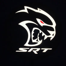 Load image into Gallery viewer, SRT led sign lit up with a white dragon design on a black background