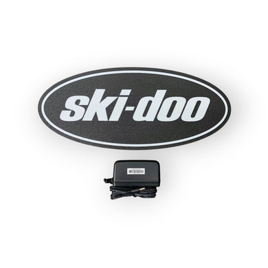 Ski-Doo led sign with power adapter on a white background