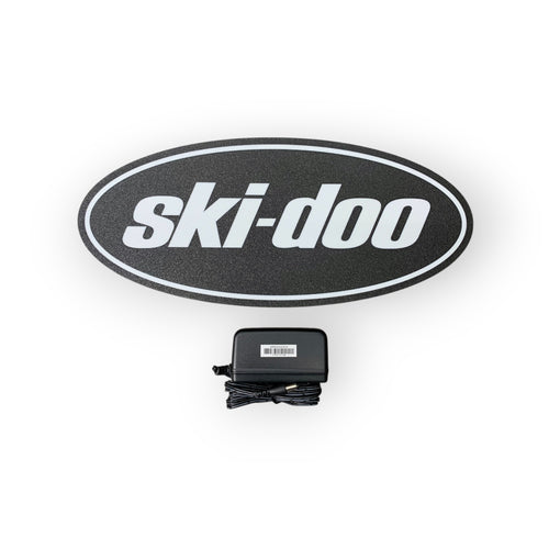Ski-Doo led sign with power adapter on a white background